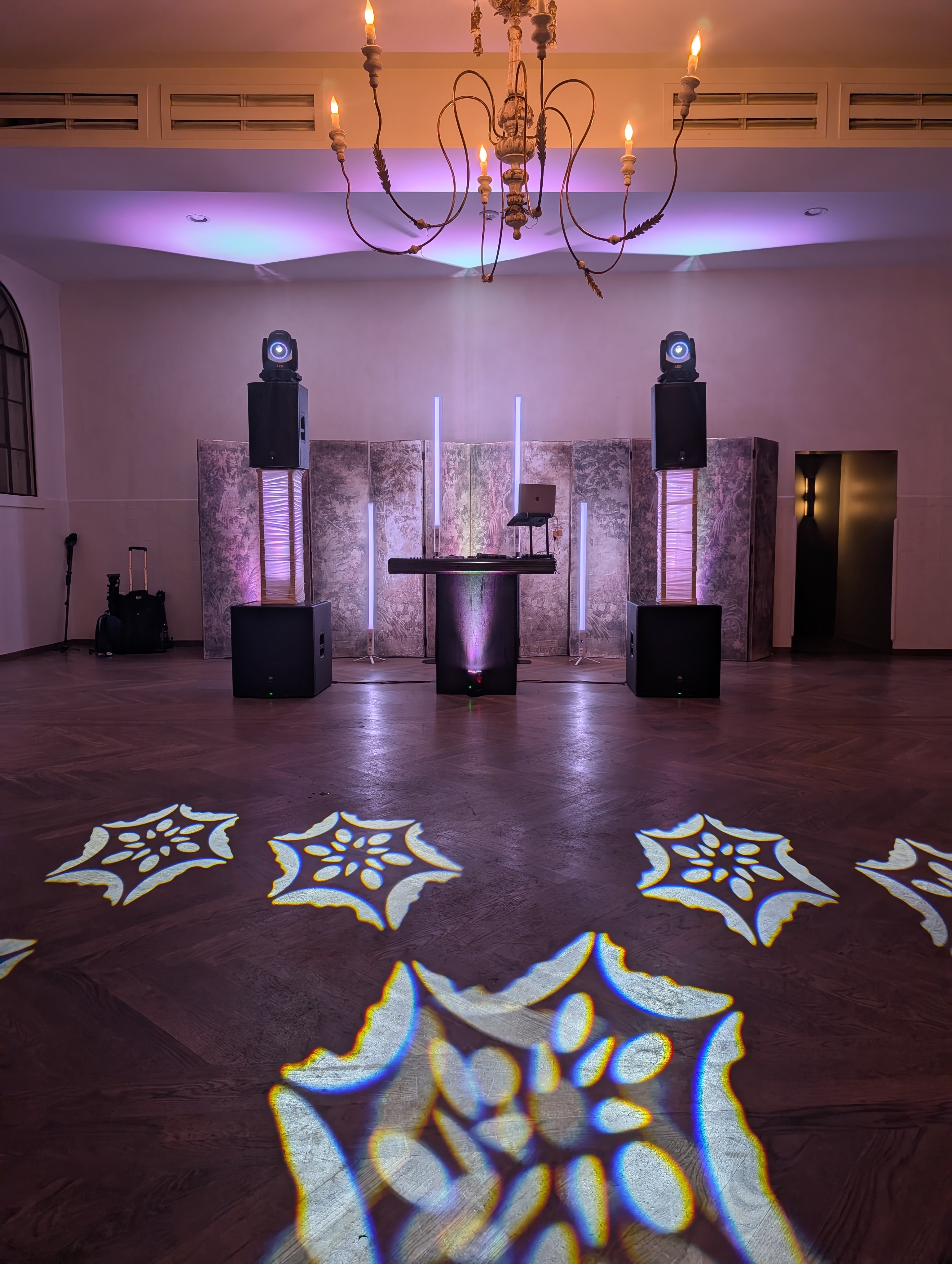 Classic DJ package with moving heads and GloTubes at a ballroom reception